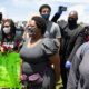 Co-Founder of Organization Black Lives Matter Patrisse Khan-Cullors Marching During The Protest Against Police Violence | BLM Cofounder Resigns Over Lavish Lifestyle | Featured