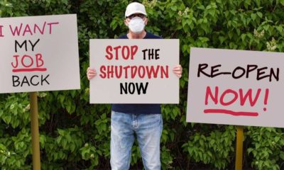 Man protesting against lockdowns-Democratic States Lost Double The Jobs Republican States Lost During Pandemic-ss-Featured
