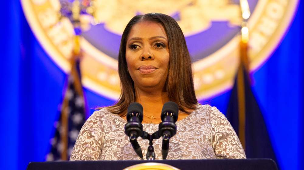 State Attorney General Letitia James addresses during Governor Andrew Cuomo inauguration for third term at Ellis Island | New York attorney general investigating Trump Organization | Featured