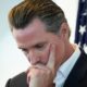 California State Governor Gavin Newsom holds his head in though before a meeting | It’s Official: California Recalls Gov. Gavin Newsom | featured