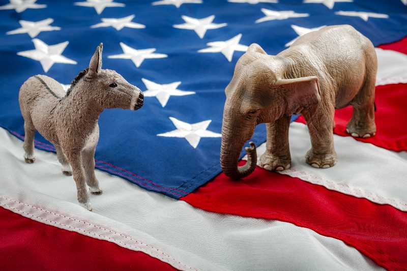 Democrats vs republicans are facing off in a ideological duel on the american flag | 5 Reasons Many Feel The American Political System Is Failing