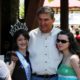 Governor Joe Manchin poses for cell phone photo with a local beauty queen and her friend during the Webster County Woodchopping Festival | Manchin Won’t Support Democrats’ Voting Rights Bill | featured