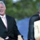 President Bill Clinton (L) and his wife, U.S. Senator Hillary Clinton (D-NY), laugh at the Greater New York Billy Graham Crusade | Reporter Who Broke Clinton Tarmac Meeting Found Dead | featured