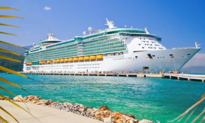 Royal Caribbean cruise ship Independence of the Seas docked at the private port of Labadee | COVID-19 Cases Delay Long-Awaited Royal Caribbean Cruise | featured