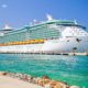 Royal Caribbean cruise ship Independence of the Seas docked at the private port of Labadee | COVID-19 Cases Delay Long-Awaited Royal Caribbean Cruise | featured