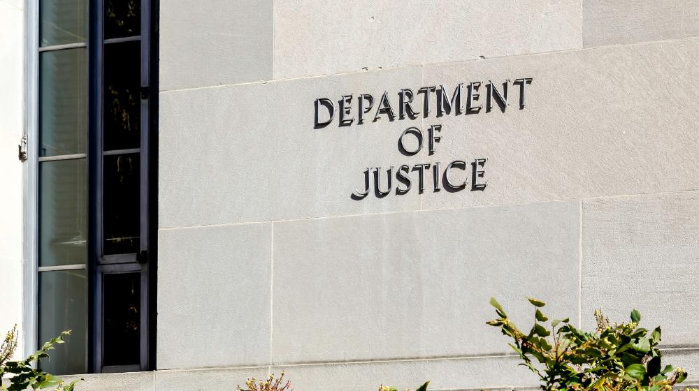 Sign of United States Department of Justice(DOJ) on their headquarters building in Washington, D.C. USA | DOJ investigating consulting firm tied to Hunter Biden | featured