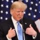 Stable Genius Trump President of the United States gestures as he addresses a press conference | Why Do So Many Elected Officials Continue Supporting Trump? | featured