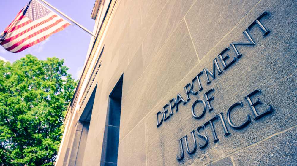 The northern facade of the Department of Justice building in the Nations capital | Justice Department will Double Staff to Fight Voter Suppression | featured