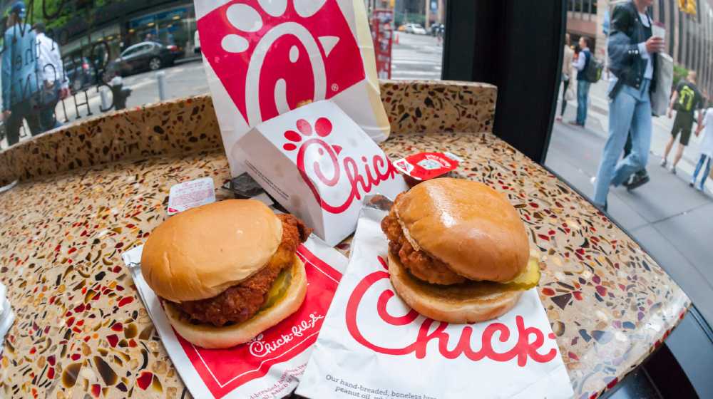 A classic Chick-Fil-A chicken sandwich and a Spicy Chicken sandwich in a Chick-Fil-A restaurant in New York | Chick-fil-A Voted Top Fast Food, McDonald’s Voted Worst | featured