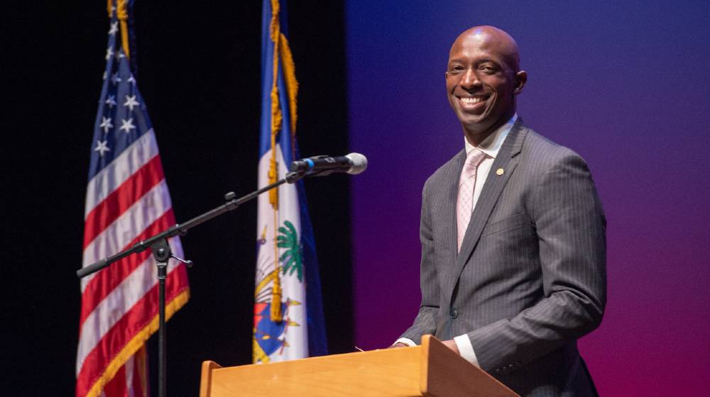 Haitian President Jovenel Moïse on stage at the Miramar Cultural Center | Two Americans Among Arrested For Haiti President Murder | featured