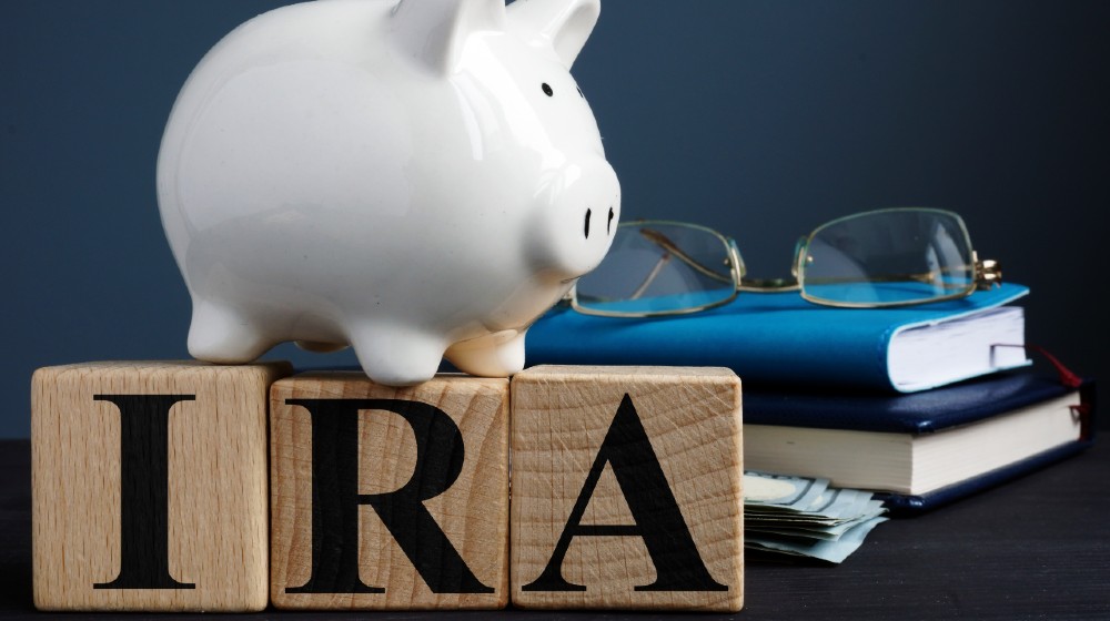 IRA individual retirement account written on wooden cubes | The Power of Self-Directed IRA's | featured