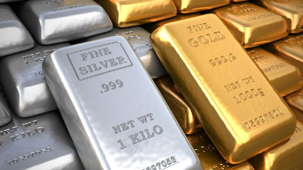 Silver ingot and gold bullion | Investing In Gold And Silver For Your Retirement | featured