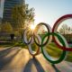 The five ring symbol of the Olympic Games at tokyo museum with sun light and flare | Tokyo Olympics Covid spike | featured