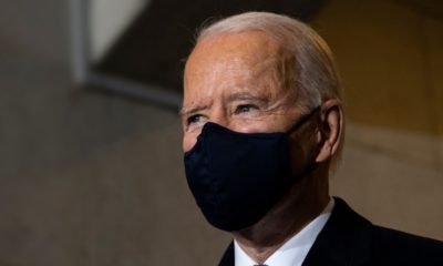 President of the United States, Joe Biden wearing a mask | Biden Calls On More Companies To Issue Vaccine Mandates | featured