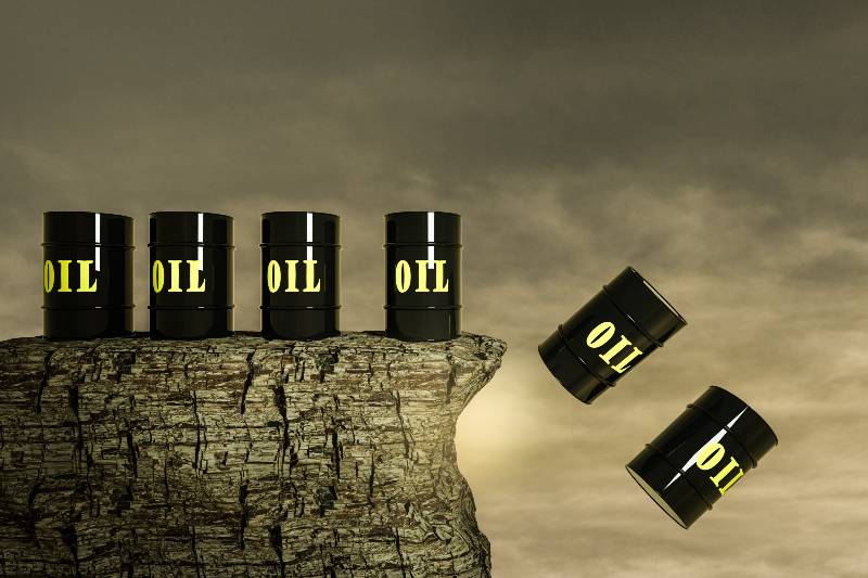 Black Metal Oil Barrels on a stone cliff in a sunset day-Energy Policies