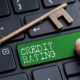 Closed up finger on keyboard with word CREDIT RATINGS | Easy Credit Repair Services to Improve Your Credit Rating | featured