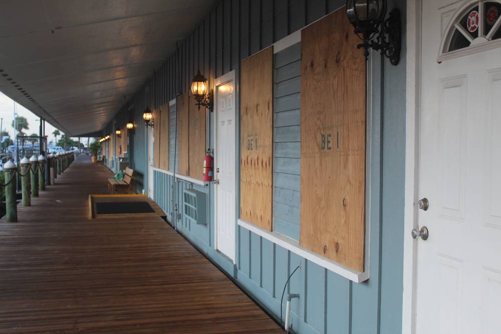 Harbortown Marina boarded up preparing for the impact of Hurricane Dorian at Category 4 | Tips to Help Prepare Homeowners For Hurricanes | featured
