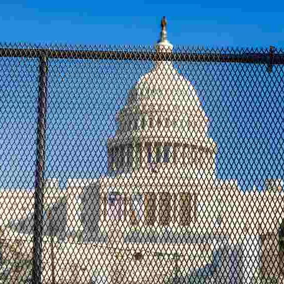 New security and fencing in place at the Nation's Capitol after the building was stormed by Trump-supporting rioters | Man from Greer arraigned in connection to US Capitol attack incident | featured