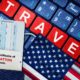 US new normal travel concept with passport, boarding pass, face mask with US flag and certificate of COVID-19 vaccination | US Eases Entry For Fully Vaccinated Foreign Air Travelers | featured