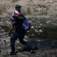 a group of 25 immigrants from Haiti crossed the Rio Grande natural border between Mexico and the United States | DHS Admits 70% of Haitian Migrants Already Released in US | featured