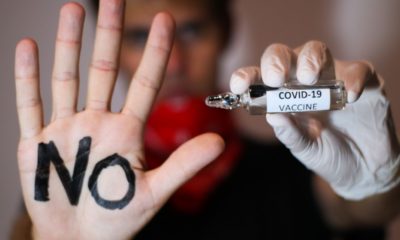 A anti vax or anti vaccine protests against the new covid-19 vaccine | College Students Prefer Dropping Out Rather Than Getting Vaccine | featured