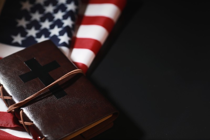 American flag and holy bible book on mirror background-American Missionaries