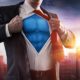 Businessman Superhero With Sunset In City | Jon Kent, the New Superman, Reveals Self As Bisexual | featured