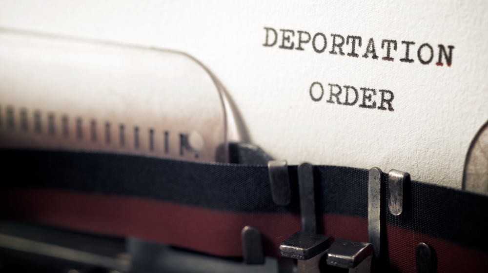 Deportation order phrase written with a typewriter | Solages: U.S. must end accelerated deportation of Haitian migrants | featured