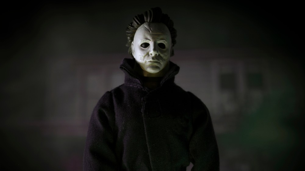 Portrait of slasher Michael Myers | How To Watch All 12 Michael Myers ‘Halloween’ Movies In Order | featured