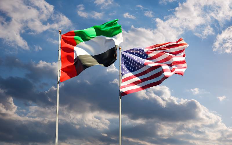 Flags of USA and UAE together against the sky background-F-35s