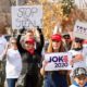 Pro Trump supporters at Stop the Steal rally holding signs against the media declaring Joe Biden President elect | NBC Poll: 22% Of GOP Voters Say Biden Didn’t Win 2020 Polls | featured