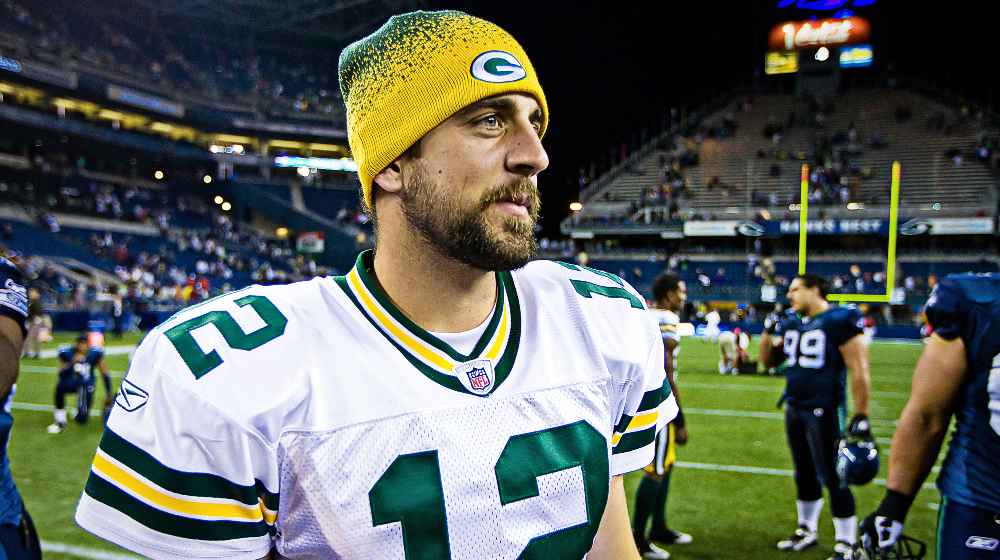 Superbowl Champion Green Bay Packers Quarterback Aaron Rodgers | State Farm Supports Aaron Rodgers’ Choices But Drops His Ads | featured