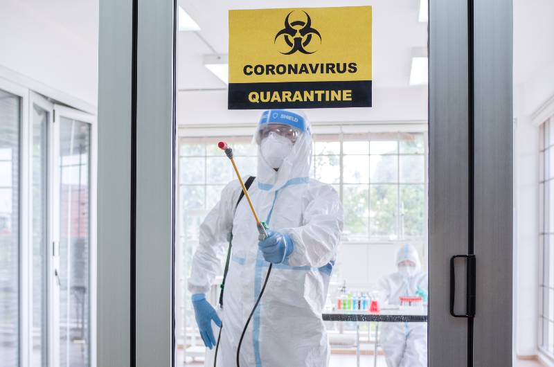 Asian man wear personal protective suits or PPE | COVID Quarantine