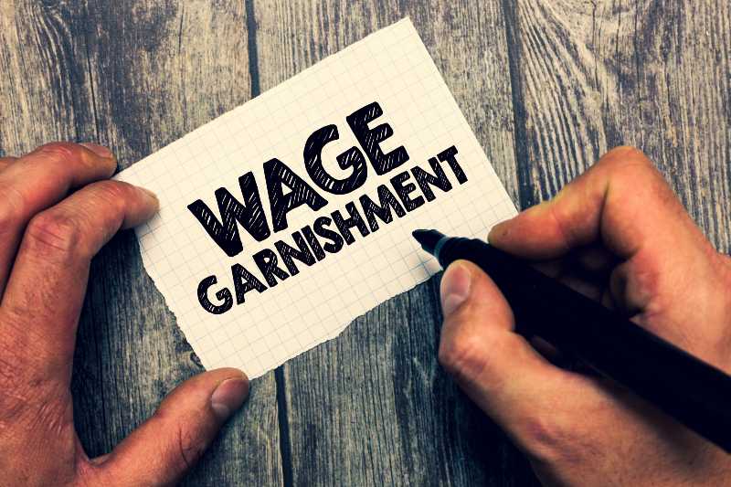 Conceptual hand writing showing Wage Garnishment | Wage Garnishment