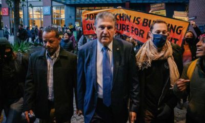 Senator Joe Manchin is confronted by climate activists | GOP To Welcome Joe Manchin If He Decides To Switch Sides | featured
