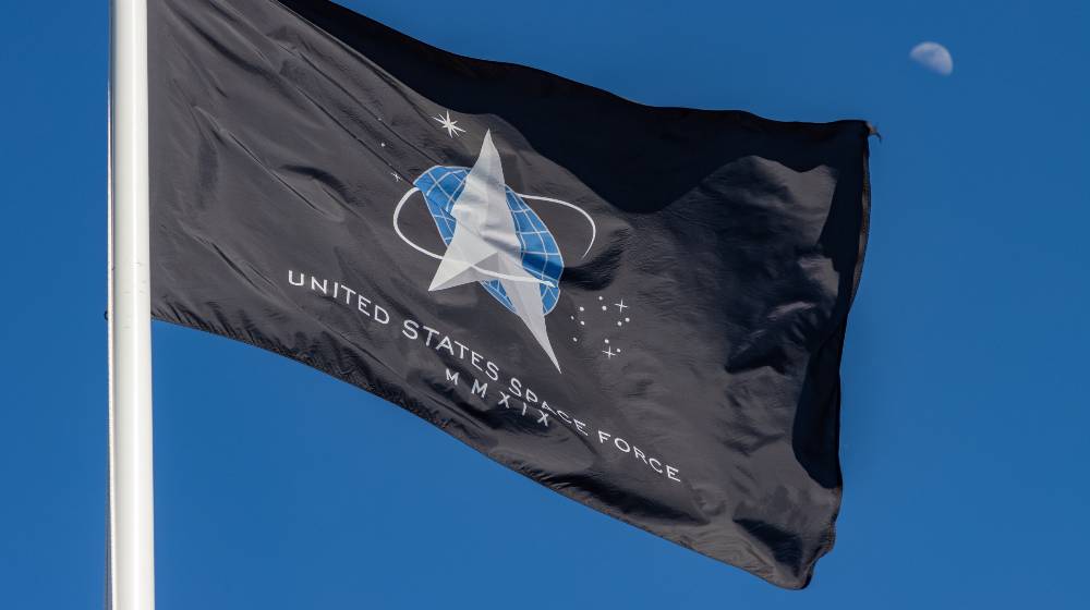 The flag of the United States Space Force flies high | Space Force Says Russia, China Attack US Satellites Regularly | featured