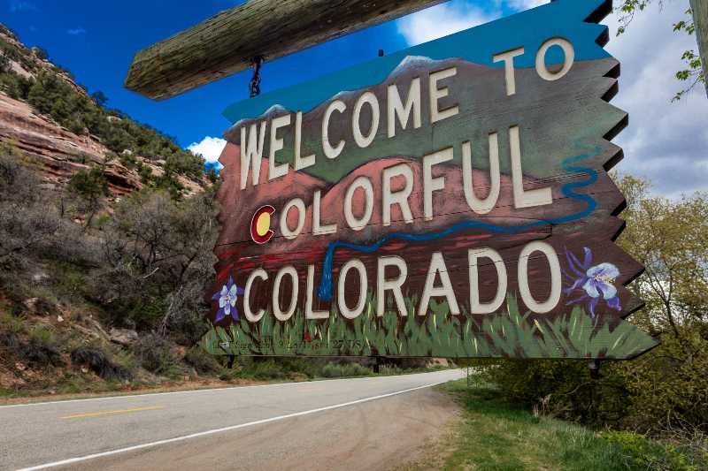 Welcome to Colorful Colorado State Road Sign near Utah Colorado border | Jared Polis