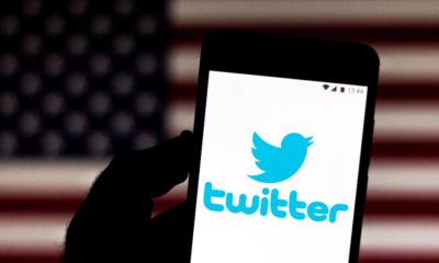Twitter logo is displayed on a smartphone | Twitter Bans Marjorie Taylor Greene’s Personal Account Permanently | featured