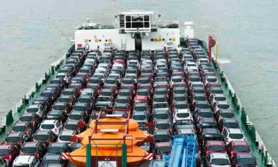 Boat carries a lot of cars to market | Cargo Ship Carrying Porsches Are Burning In The Atlantic Ocean | featured