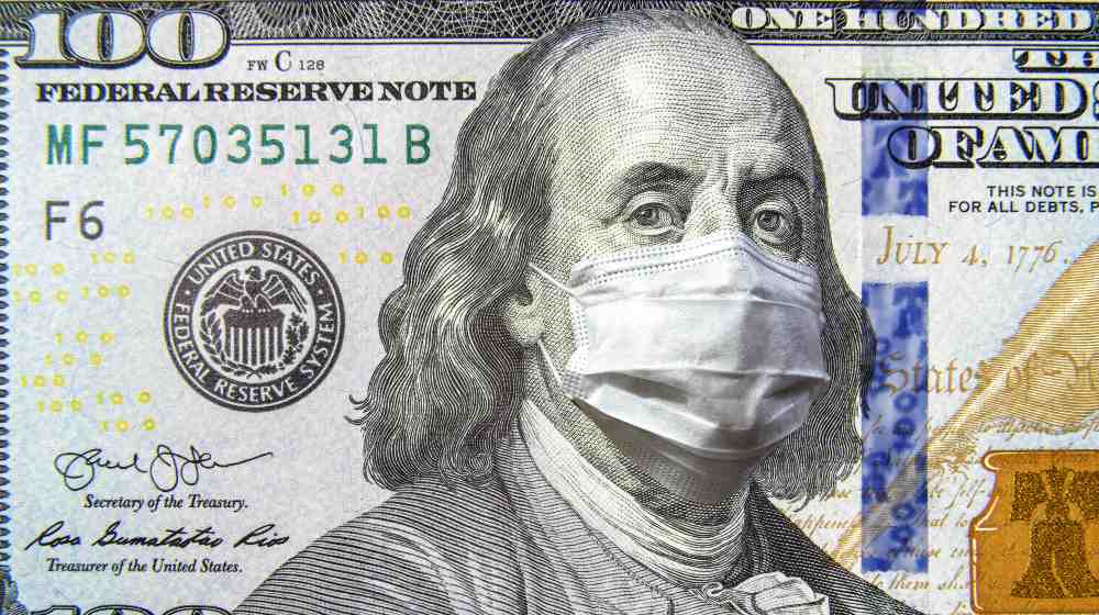 COVID-19 coronavirus in USA, 100 dollar money bill with face mask | Biden Wants Another $30 Billion To In New Coronavirus Aid | featured