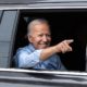 President Joe Biden points to the crowd outside of his first 2020 presidential campaign-Joe Biden-SS-Featured