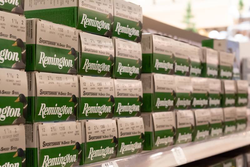 Shelves of Remington shotgun shells at a popular hunting and outdoors sporting goods retailer | Remington Settles With Families of Sandy Hook Victims 