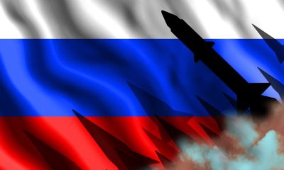 Silhouettes of rockets against the background of the flag of Russia | Russia Goes Into Nuclear Alert As War With Ukraine Escalates | featured