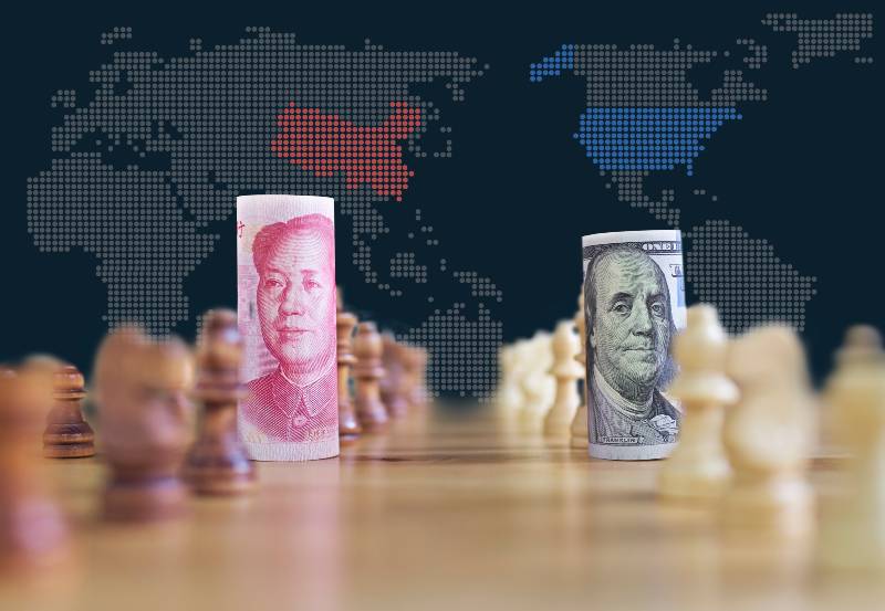 US China trade war banknotes on chess board | Phase One Deal: China Commitment to Buy US Goods Short $200 Billion