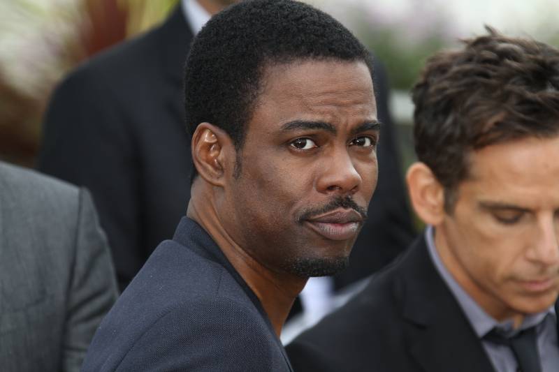 Chris Rock poses at the 'Madagascar 3 | Unscripted Action During Oscar Awards