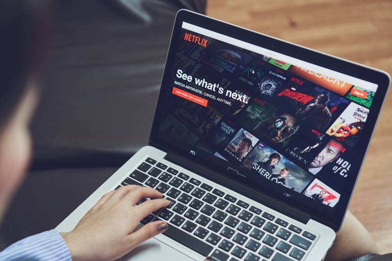 Netflix app on Laptop screen | Netflix Wants To End the Practice of Sharing Accounts Outside the Home