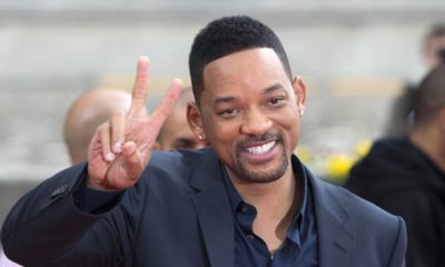 Will Smith takes photo with a fan | Will Smith Slaps Chris Rock On Stage, Later Wins Best Actor | featured
