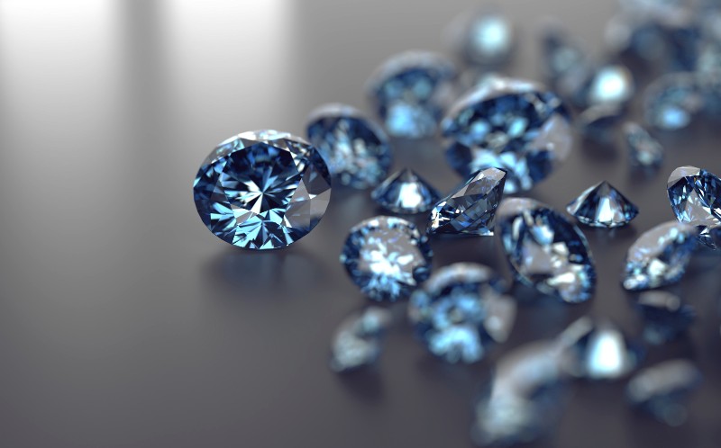 Blue diamonds placed on black background | Putin’s Response to Foreign Interference, Minneapolis Policing Investigation, 15-Carat Blue Diamond & More