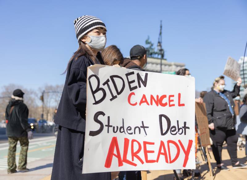 Demonstrators protest near Grand Army Plaza | Will Biden Cancel Student Debt? Deluded Schumer Wants To Believe 