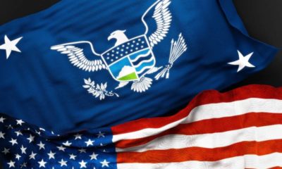 Flag of the United States Secretary of Homeland Security along with a flag of the United States of America | Higgins told DHS Secretary To Resign